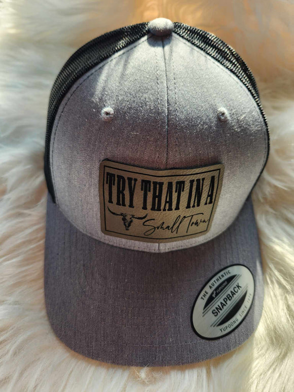 Try that in a Small Town Trucker Cap Hat with Leather Patch